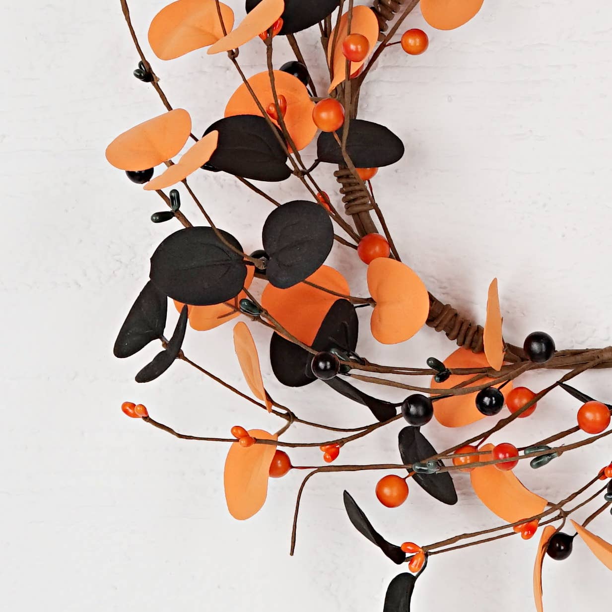 31372-14-inch(6.5)Wreath w. Black orange foam silver dollar